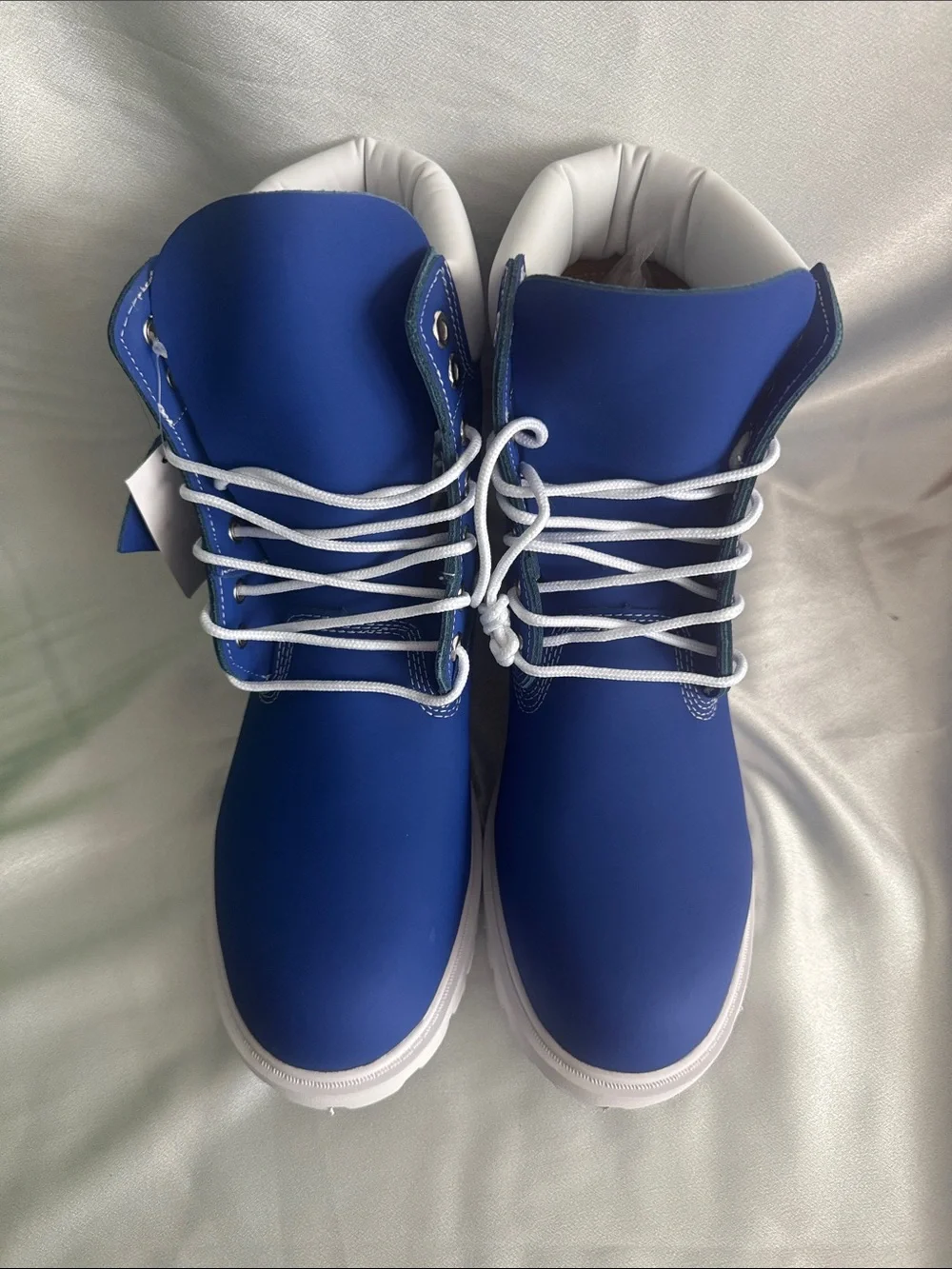 New! Timberland Premium 6-Inch boots featuring a vibrant blue nubuck upper.